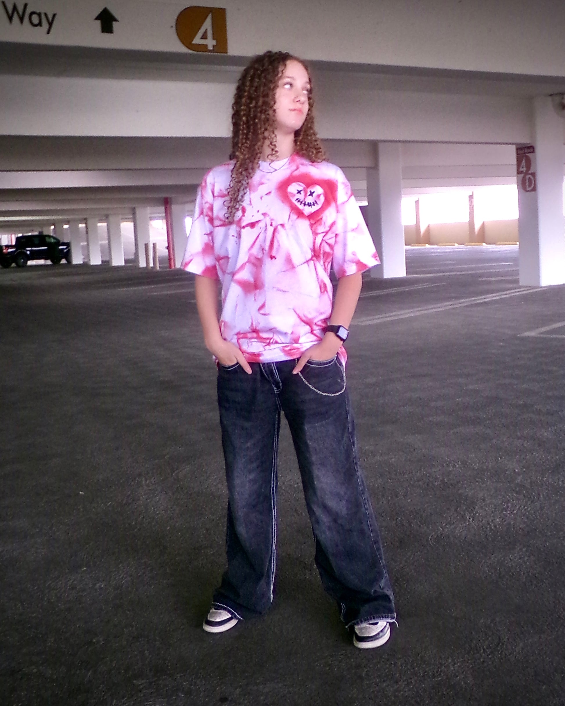 Model wearing the hand-painted Pure Love Tee