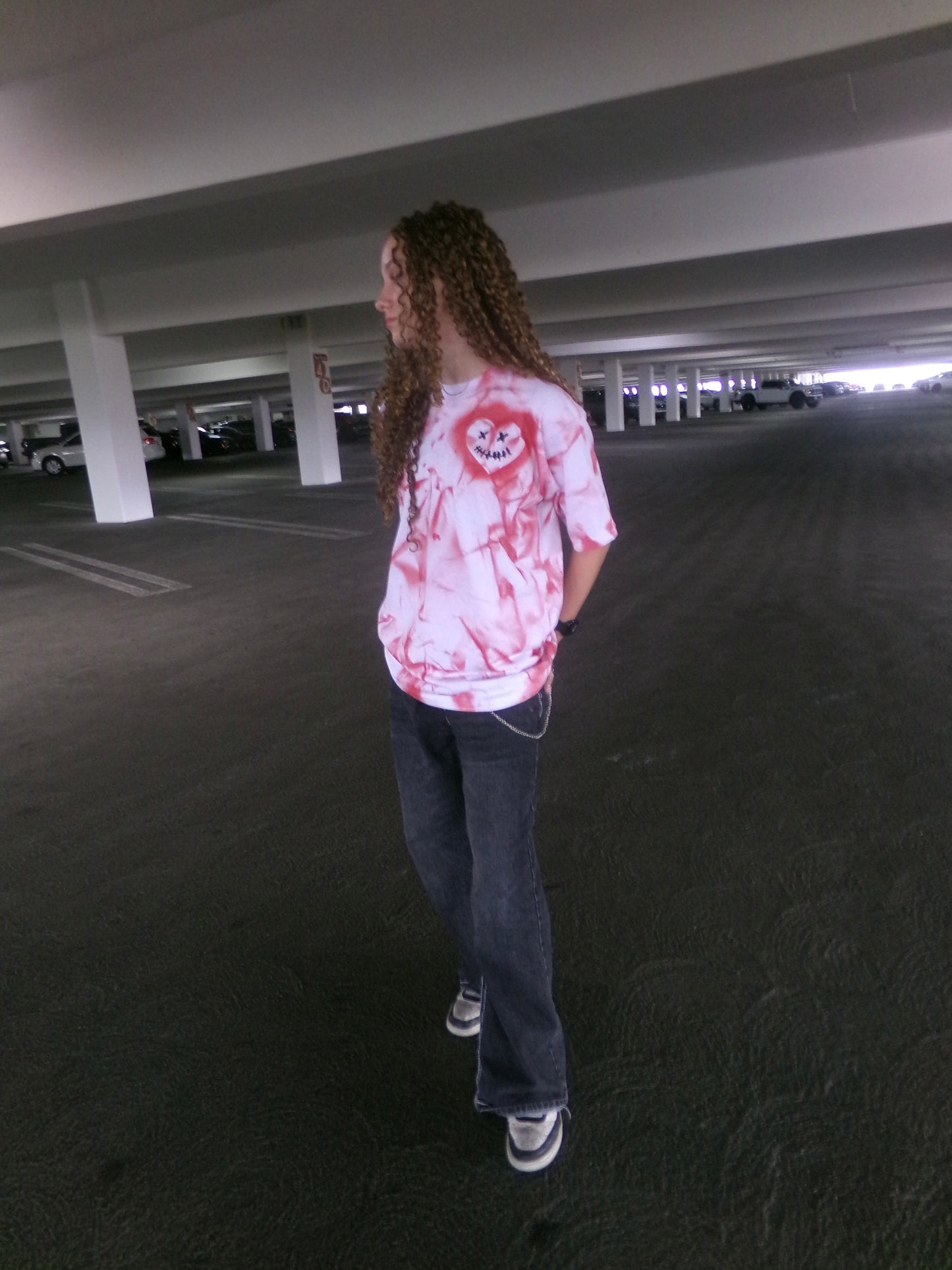 Model wearing the hand-painted Pure Love Tee