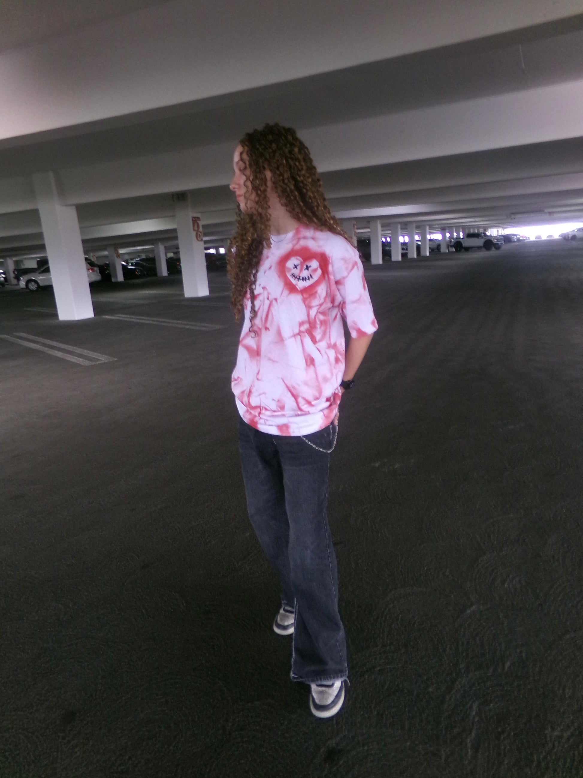Model wearing the hand-painted Pure Love Tee