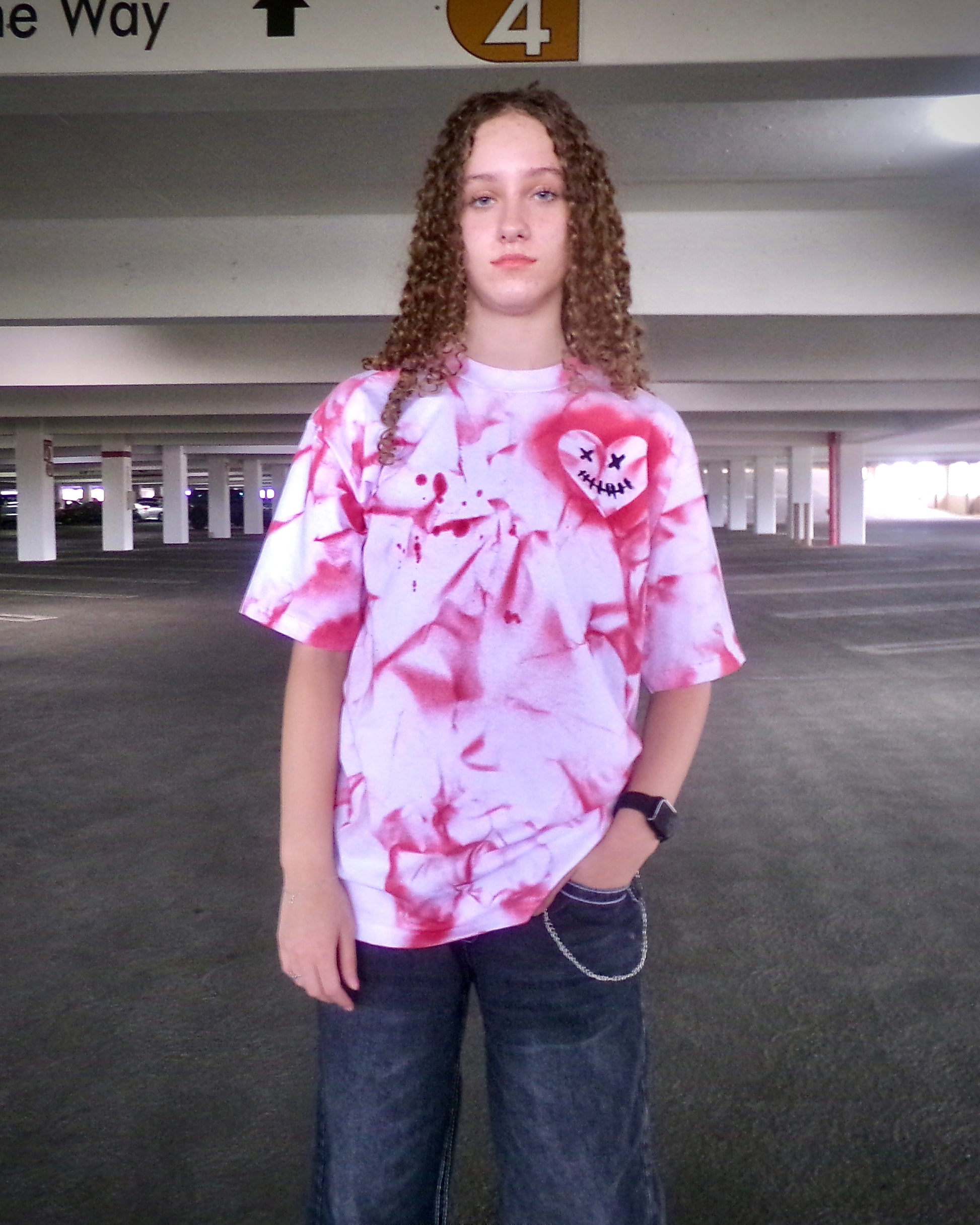 Model wearing the hand-painted Pure Love Tee