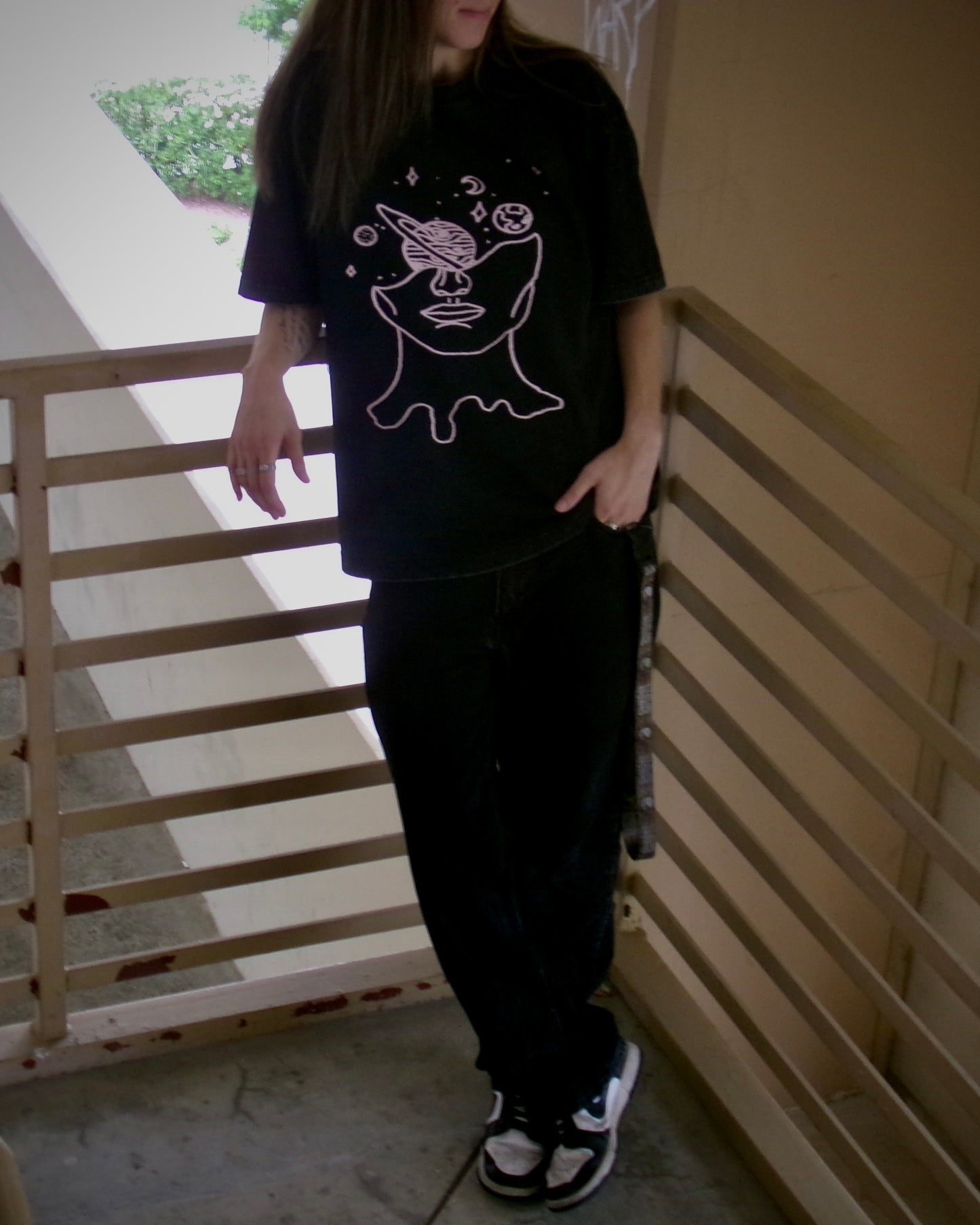 Model wearing the Lost in Thought tee
