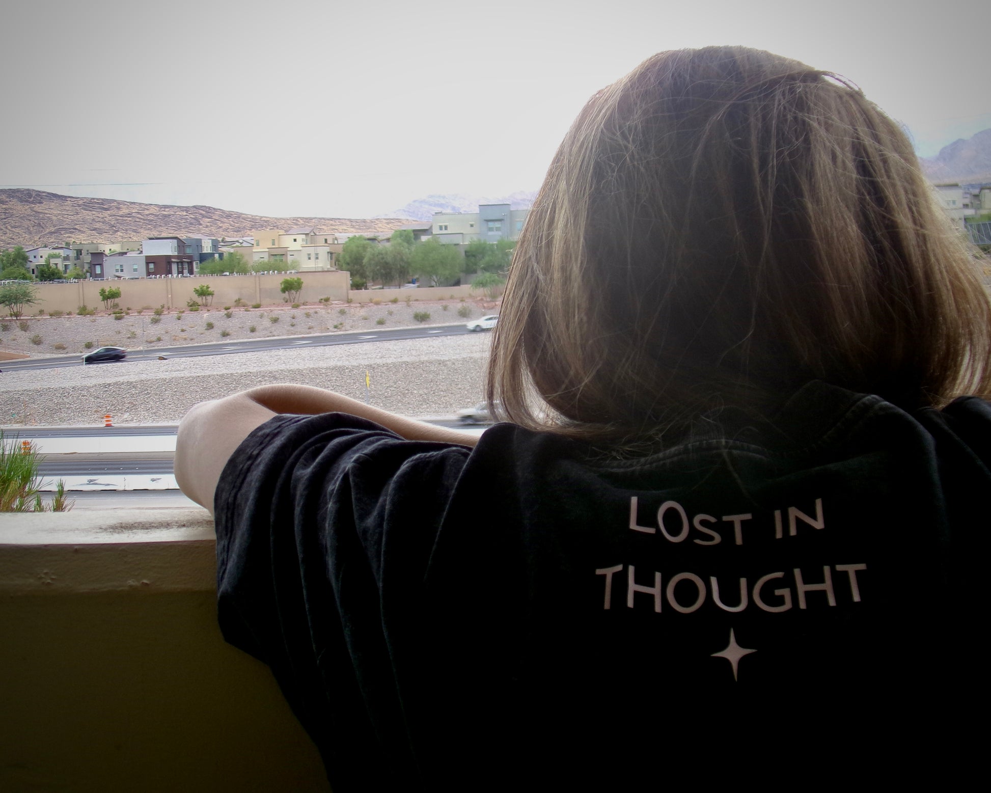 Close-up of the Lost in Thought graphic