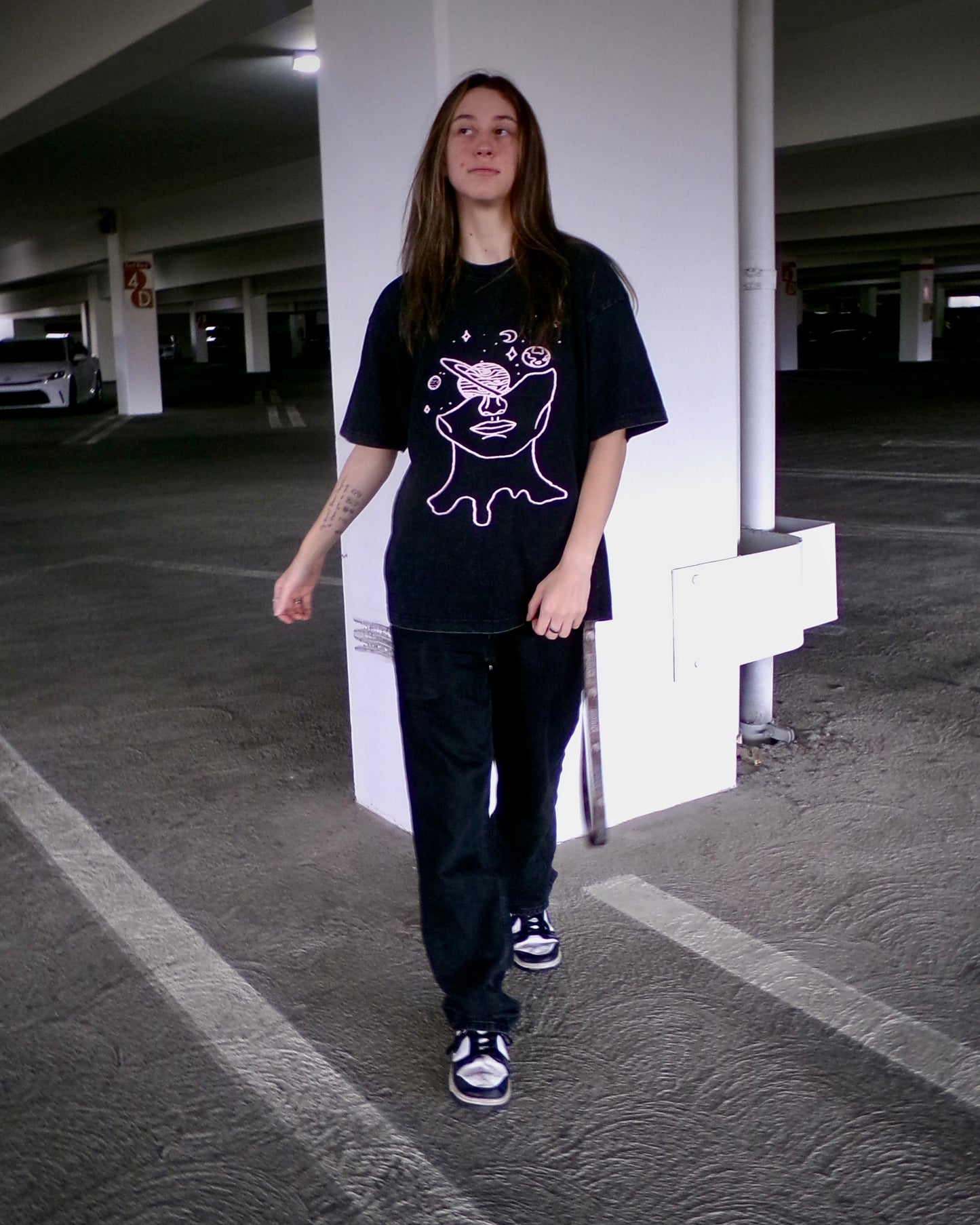 Model wearing the Lost in Thought tee