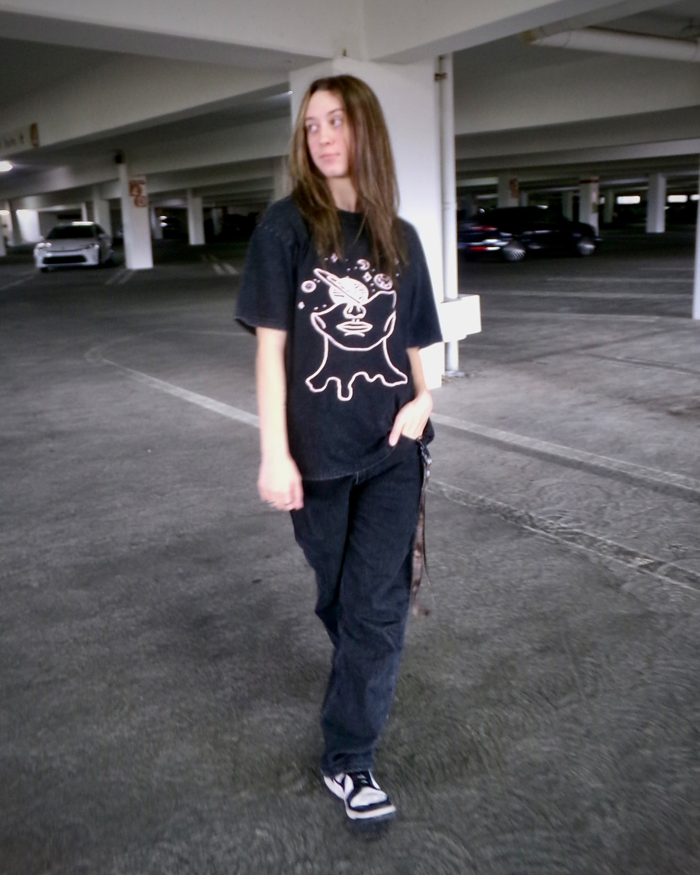Model wearing the Lost in Thought tee