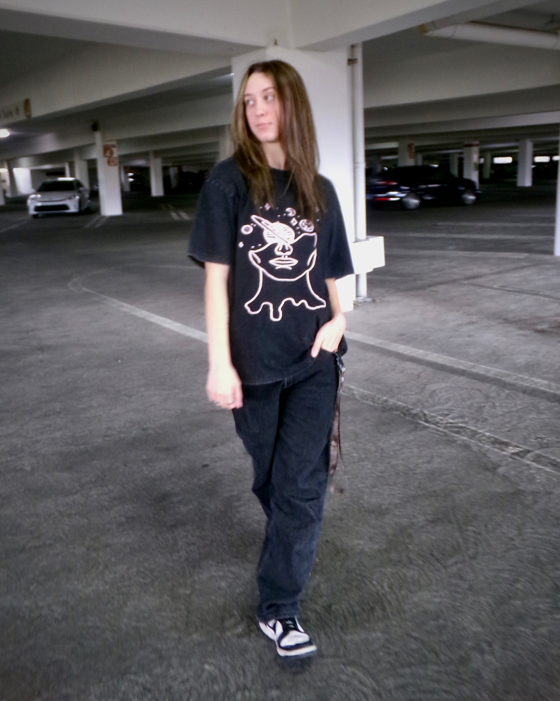 Model wearing the Lost in Thought tee