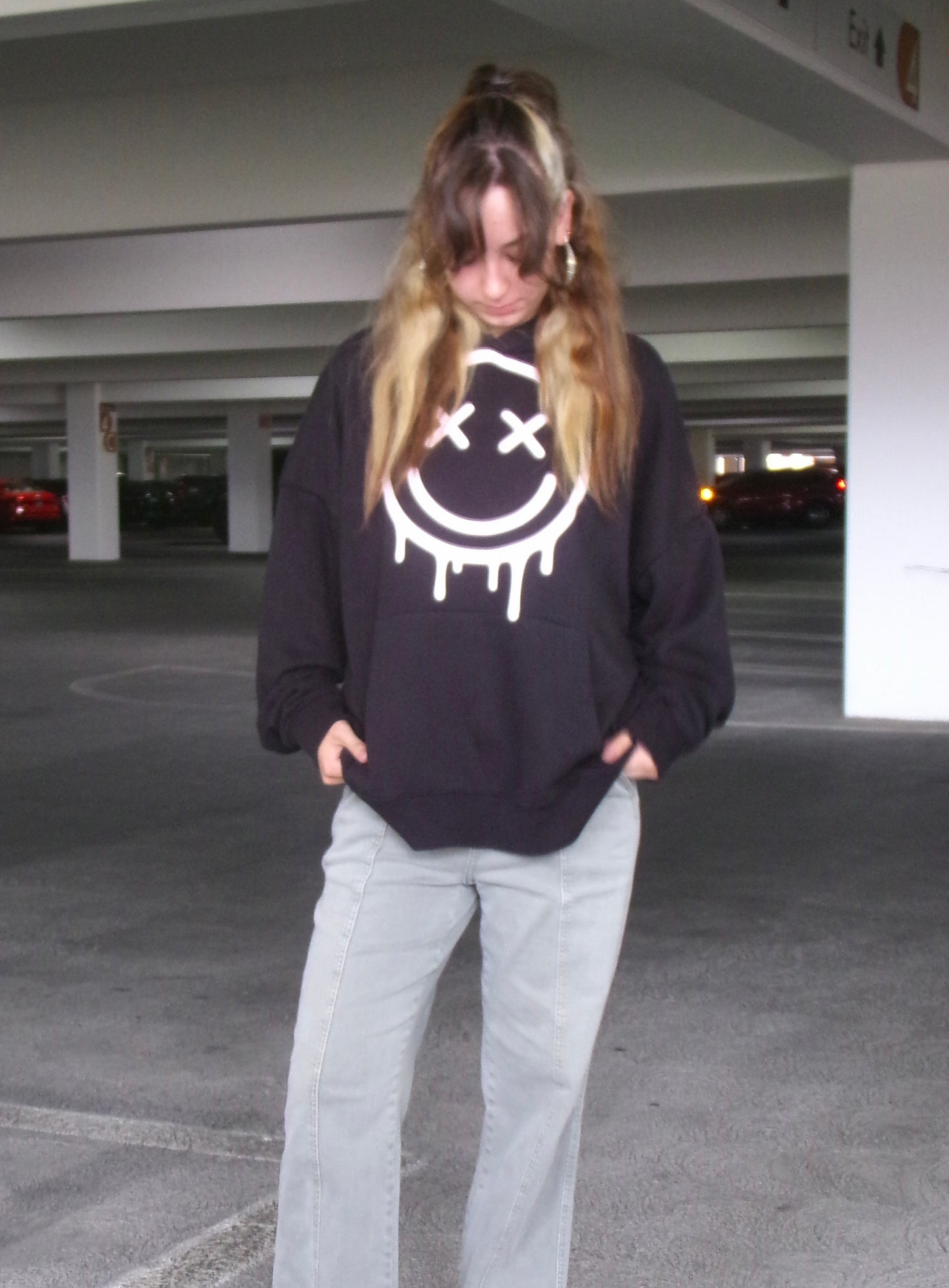 Model wearing the OUTSPOKEN Signature Hoodie