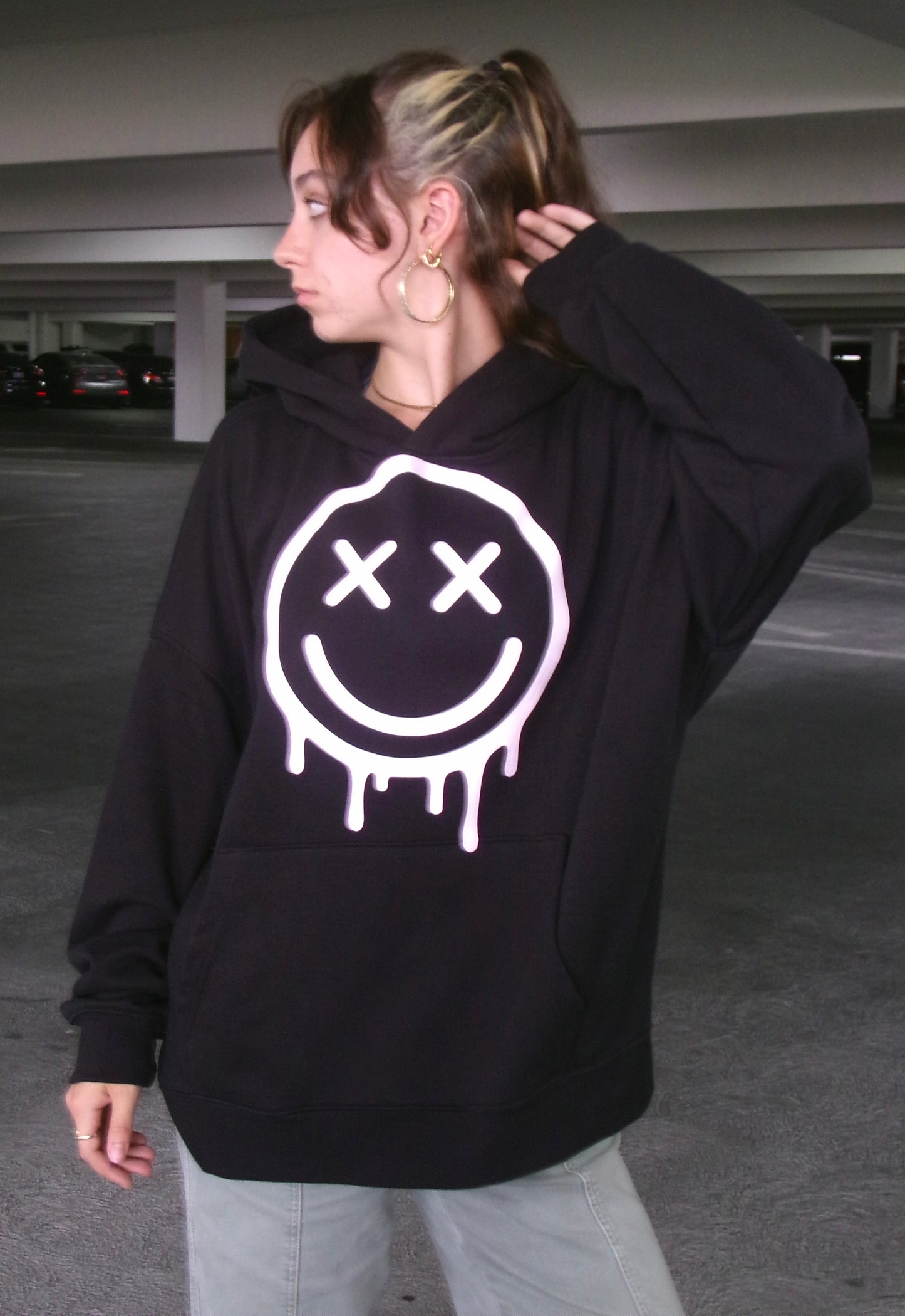 Model wearing the OUTSPOKEN Signature Hoodie