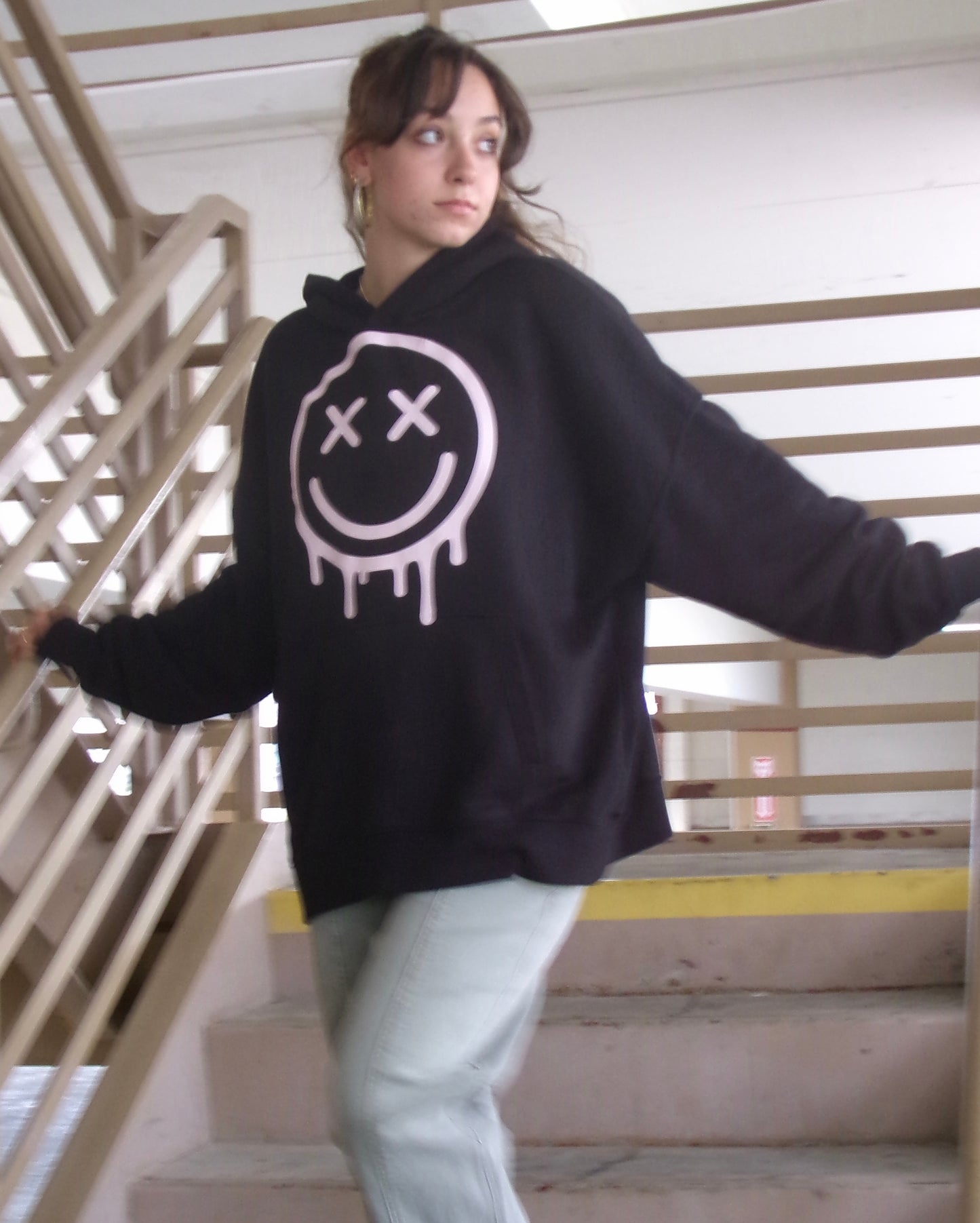 Model wearing the OUTSPOKEN Signature Hoodie